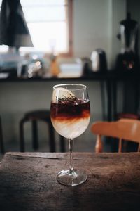 Glass of wine on table in restaurant