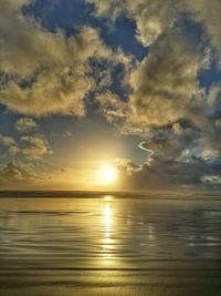 Scenic view of sea at sunset