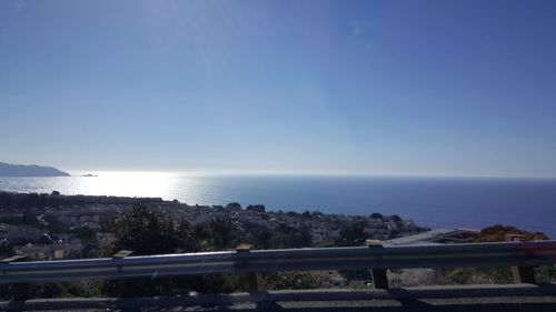 Scenic view of sea against clear blue sky