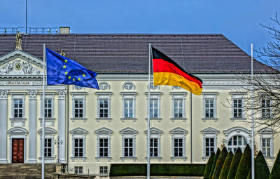 Low angle view of building against blue sky