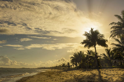 Scenic view of sea against sky at sunset