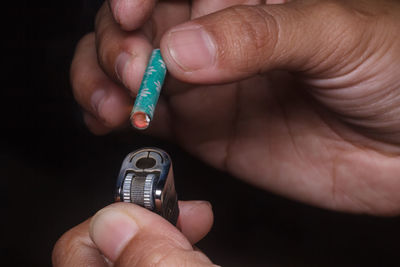 Close-up of person holding hands