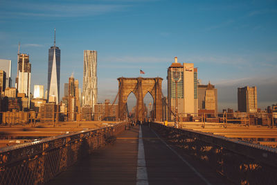 Brooklyn bridge and cityscape against sky