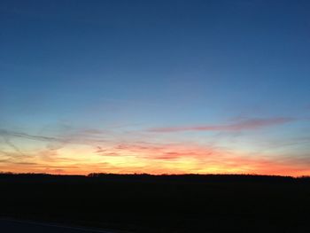 Scenic view of silhouette landscape against sky during sunset