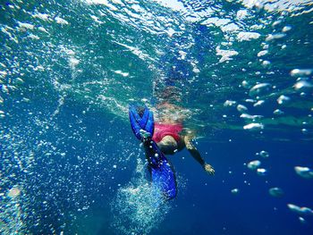 Man swimming in sea