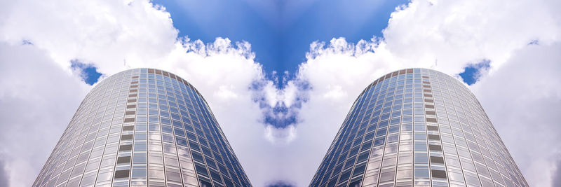 Low angle view of modern buildings against sky