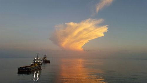 Scenic view of sea at sunset