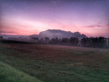 Scenic view of landscape against sky during sunset