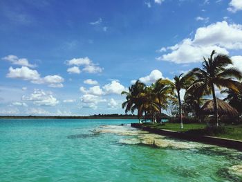 Scenic view of sea against cloudy sky