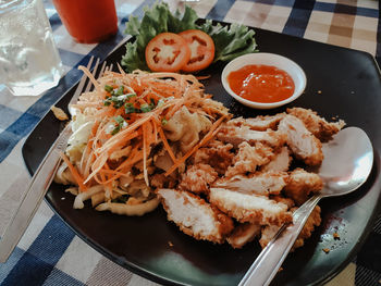 High angle view of food served on table