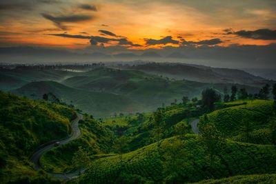 Scenic view of landscape against sky during sunset