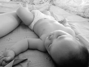 Baby sleeping in bed