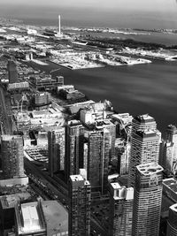 High angle view of buildings in city against sky