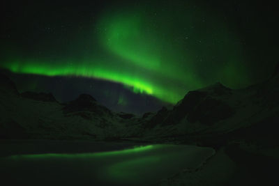 Scenic view of landscape against sky at night