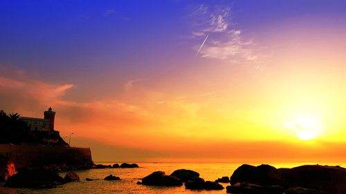 Scenic view of sea against sky during sunset