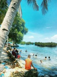 Tourists enjoying at beach