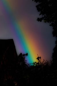 Low angle view of rainbow against sky