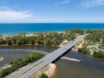 High angle view of road by sea against sky