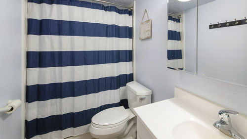 Low angle view of flags against wall at home