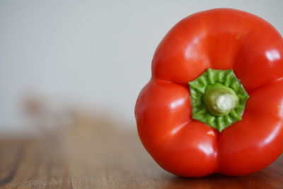 Close-up of red bell peppers on table