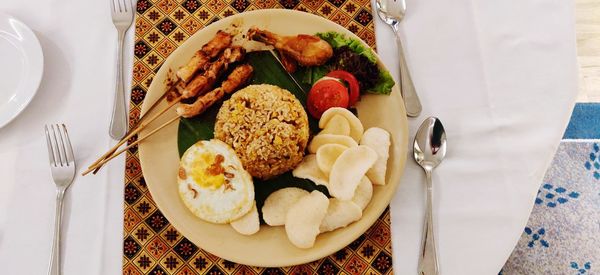 High angle view of breakfast served on table