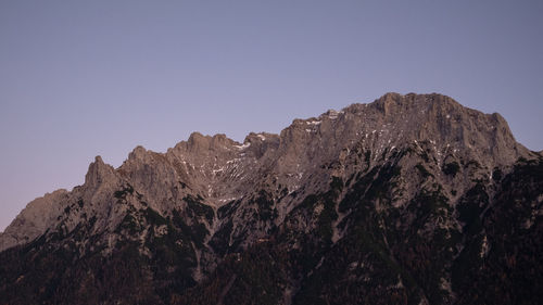 Scenic view of rocky mountains against clear sky