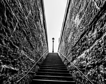 Low angle view of man on staircase