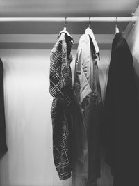 Shirts hanging in closet at home