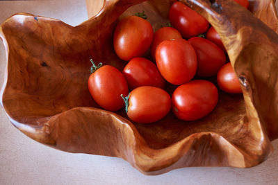 High angle view of cherry tomatoes on table