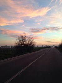 Empty road at sunset