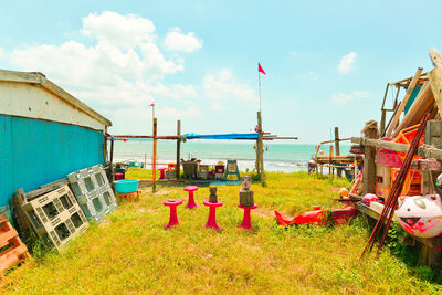 Beach and playground against sky