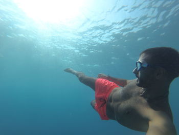 Man swimming in sea