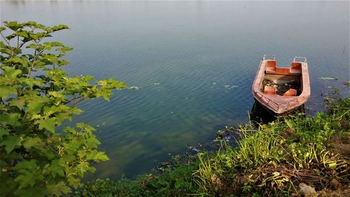 High angle view of boat moored in lake