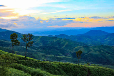 Scenic view of landscape against sky during sunset