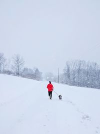 Person on snow covered landscape