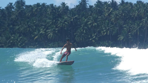 Man surfing in sea