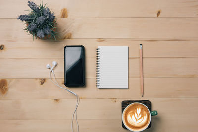 High angle view of coffee cup on table