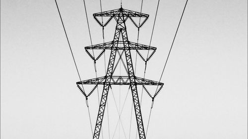 Low angle view of electricity pylon