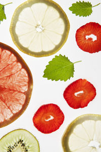 Fruit slices on white background