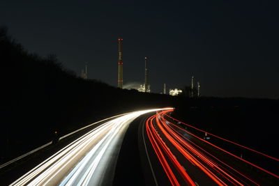 Light trails on road at night