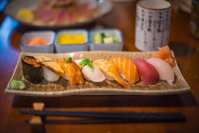 Close-up of sushi served on table