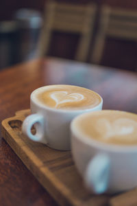 Close-up of cappuccino on table