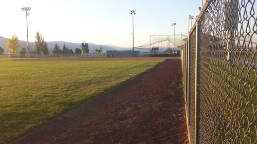 Scenic view of field against clear sky