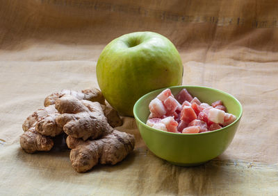 High angle view of apples in container on table