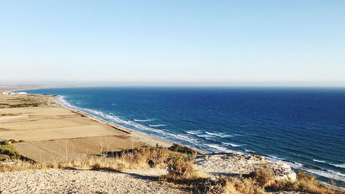 Scenic view of sea against clear sky