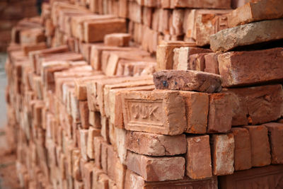 Full frame shot of pile of red bricks 