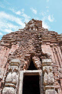 Low angle view of old building against sky