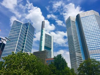 Low angle view of modern buildings against sky