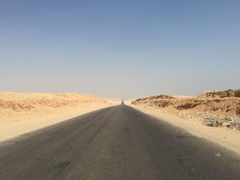 View of desert against clear sky