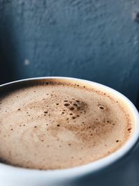 Close-up of cappuccino on table